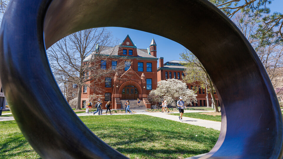 © 2023, The Board of Regents of the University of Nebraska. All rights reserved. Architecture Hall is seen through the Fragment X-O sculpture in the Sheldon Sculpture Garden. City Campus. April 13, 2023. Photo by Craig Chandler / University Communication.